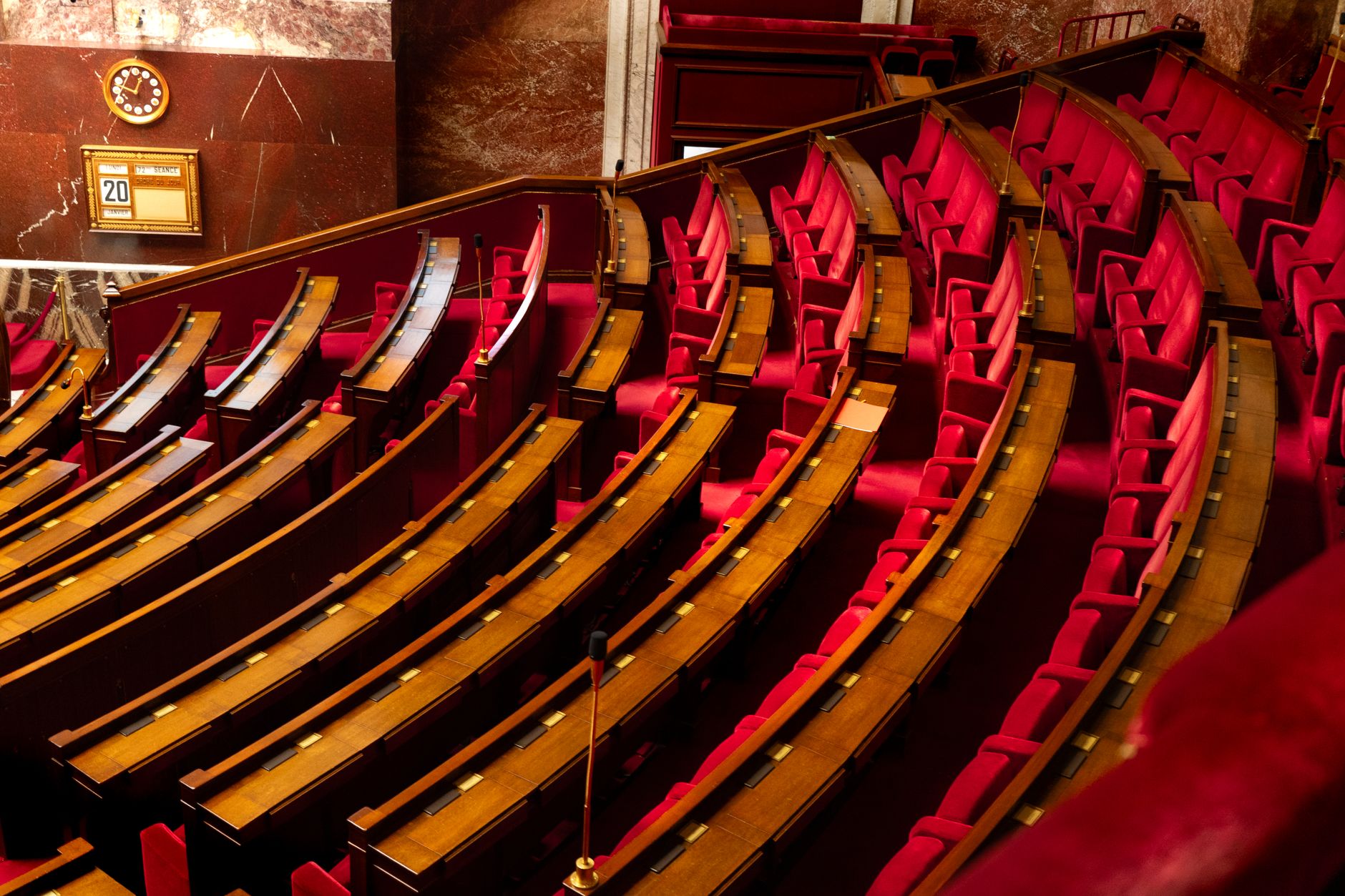elegant red seating inside legislative chamber